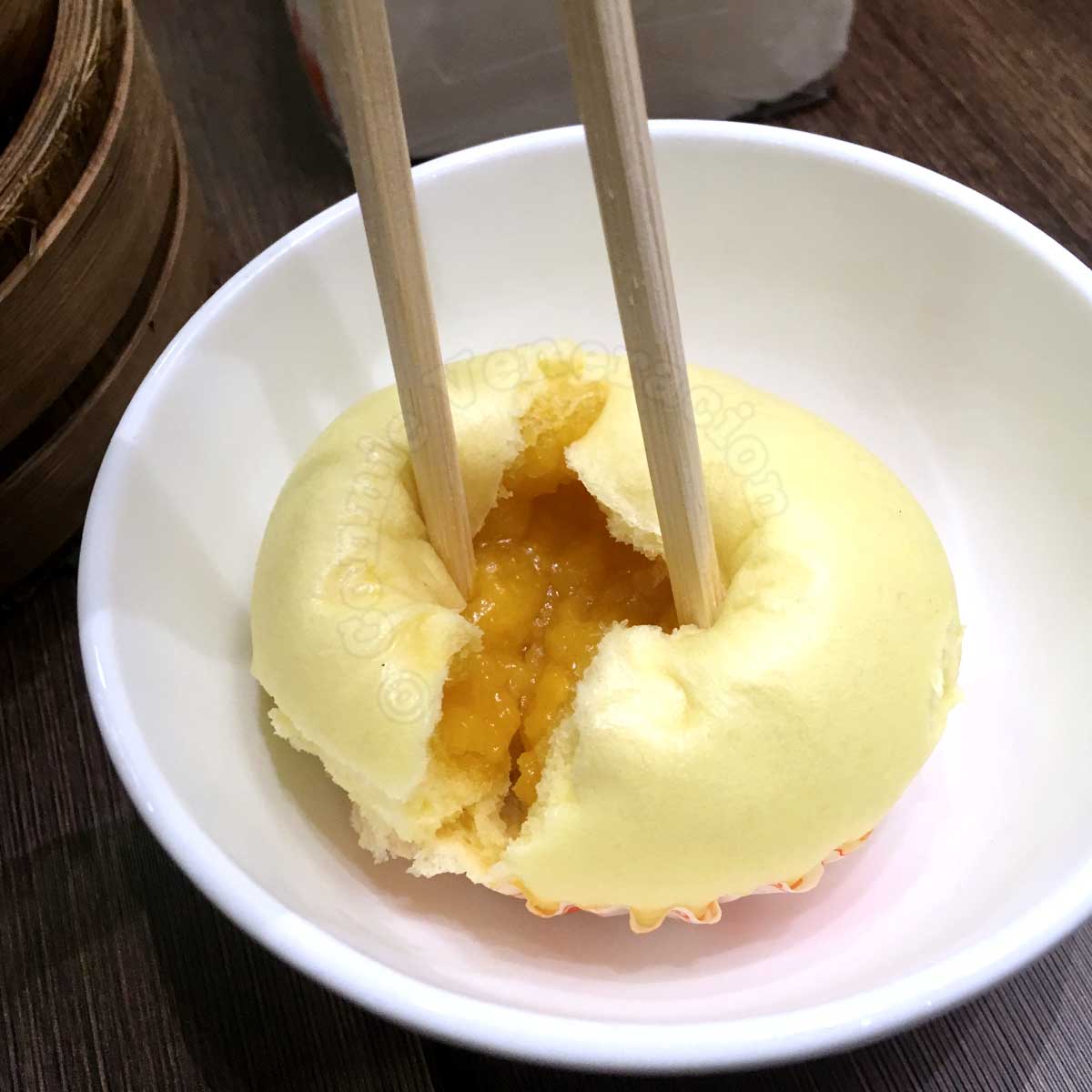 Steamed sweet buns with salted duck egg yolk filling