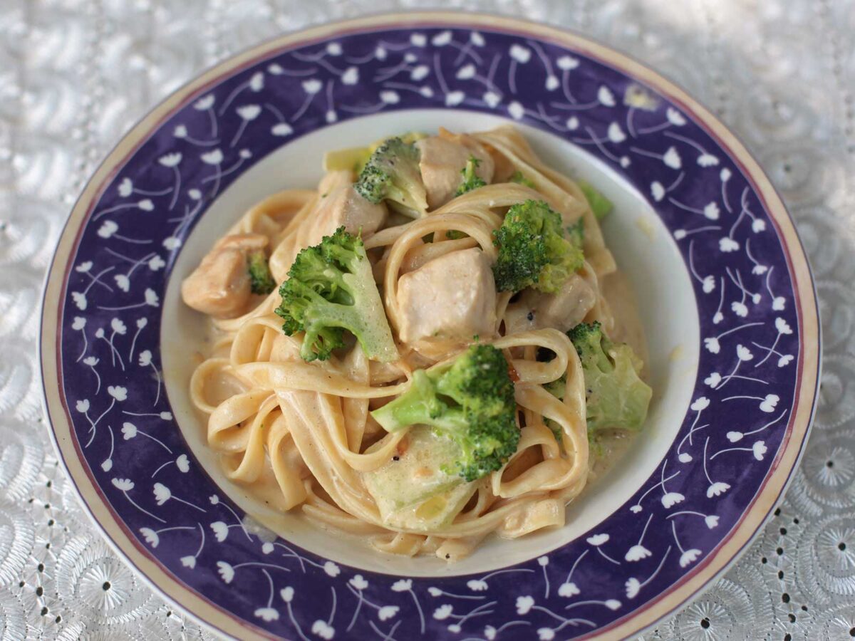 Pasta with chicken and broccoli in garlic butter cream sauce
