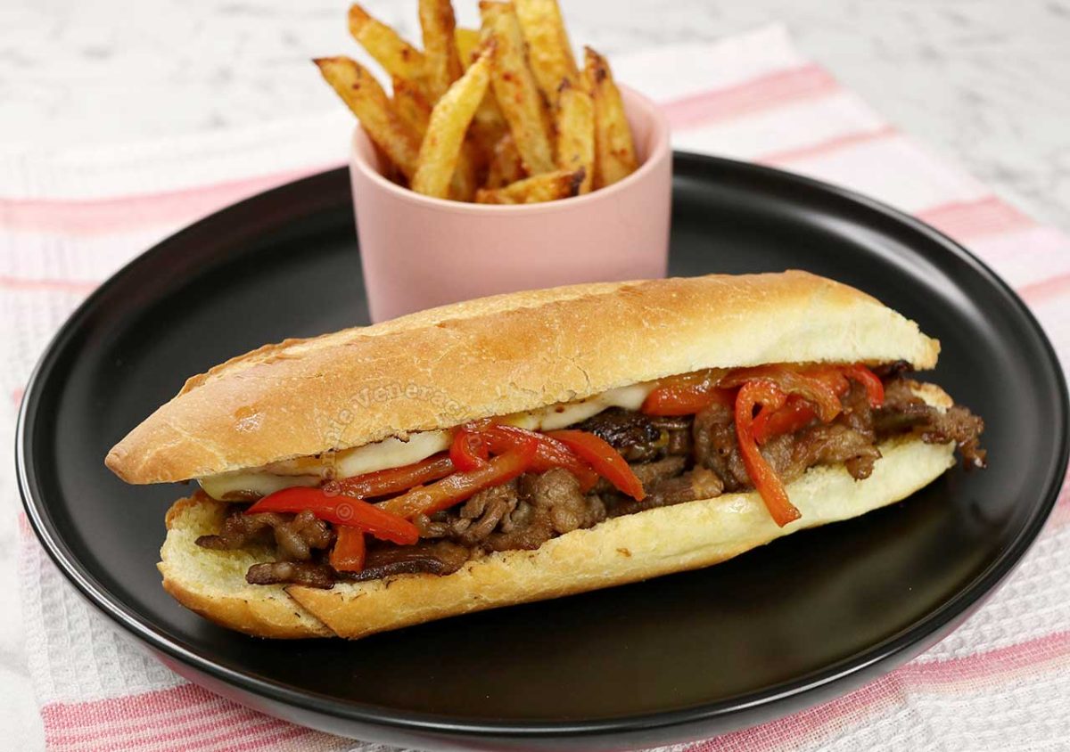 Pepper Cheesesteak Sandwich Served With Fries
