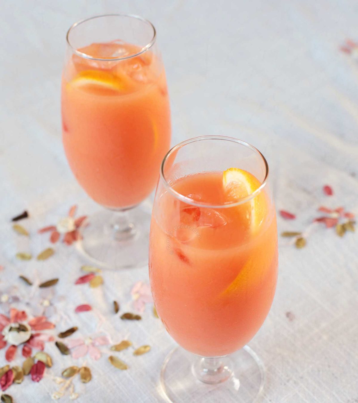 Campari orange cocktail served with orange twists