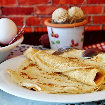 A stack of crepes on a plate