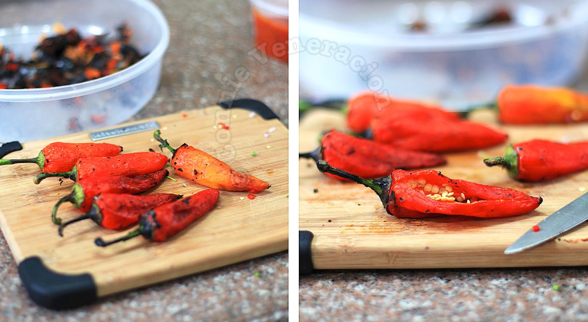 Peeling off the skin of grilled bell peppers