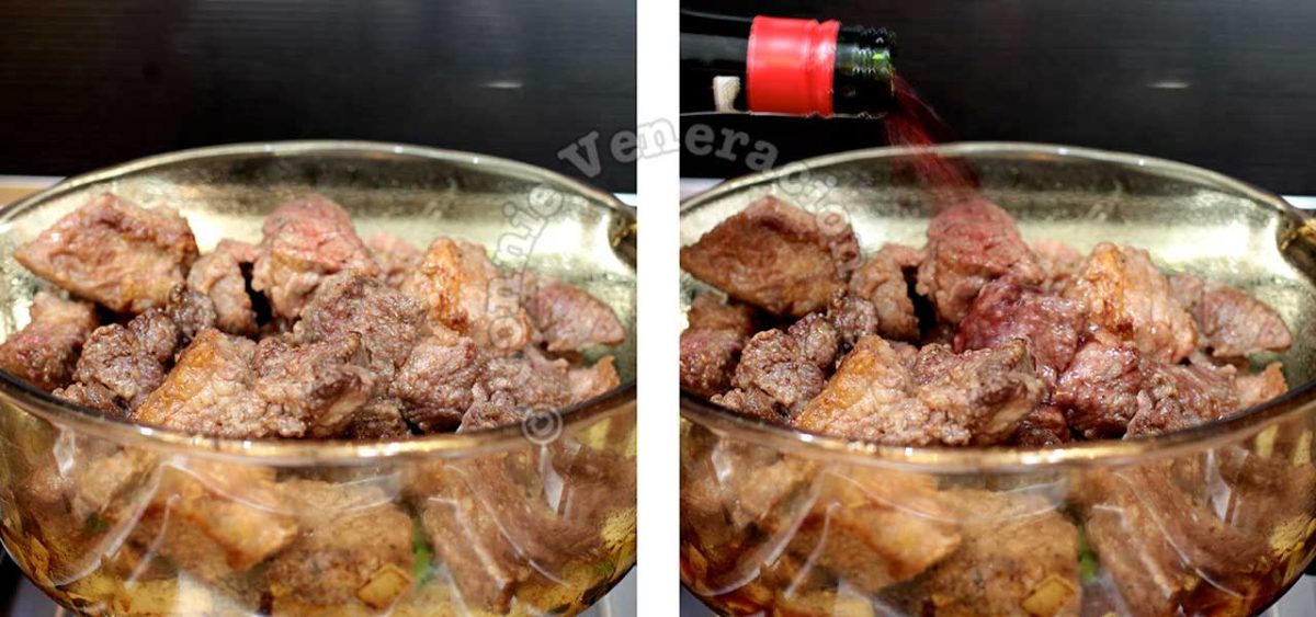 Pouring red wine over browned beef in pot