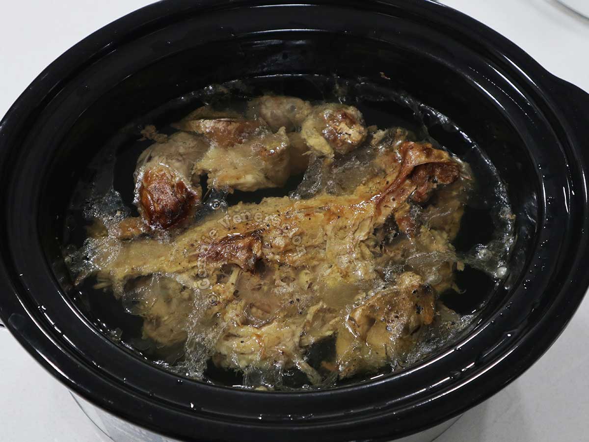 Making broth with duck bones in slow cooker