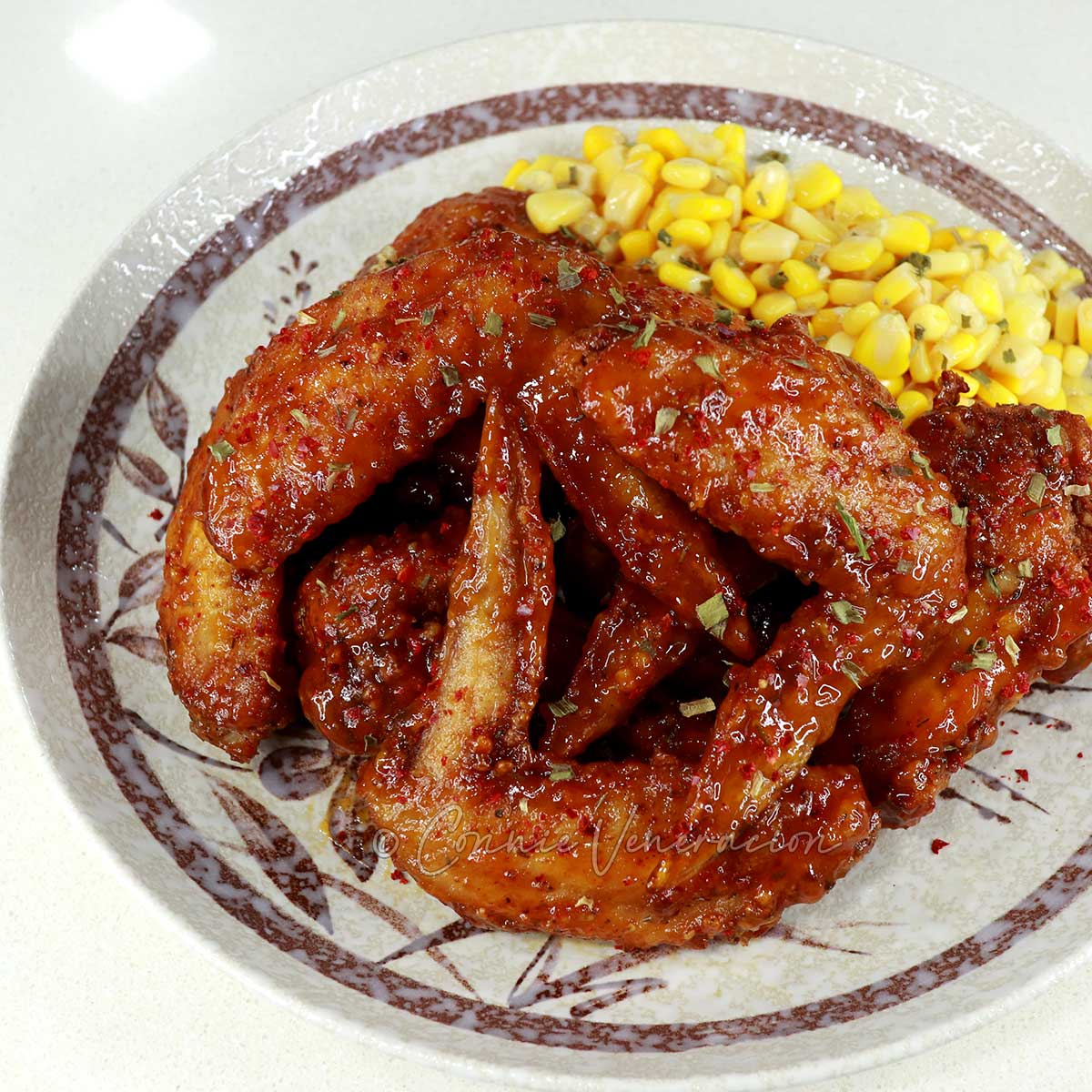Cajun fried chicken wings on serving plate