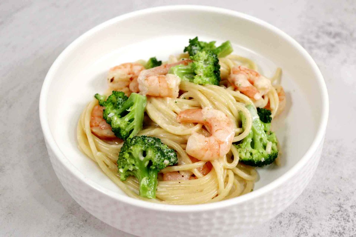 Creamy shrimp broccoli spaghetti in white bowl