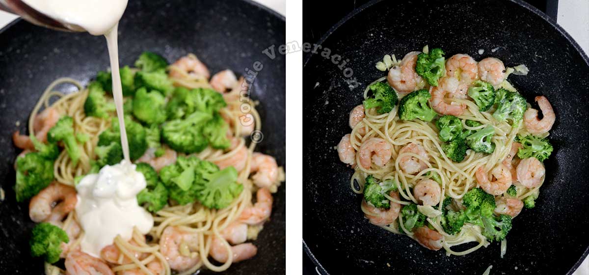 Pouring cream over shrimps, spaghetti and broccoli in pan