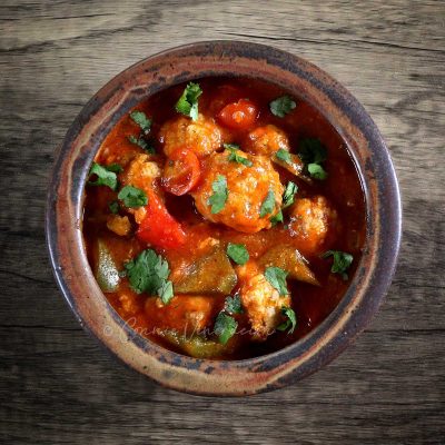 Albongigas (meatballs) and vegetables in rich tomato sauce