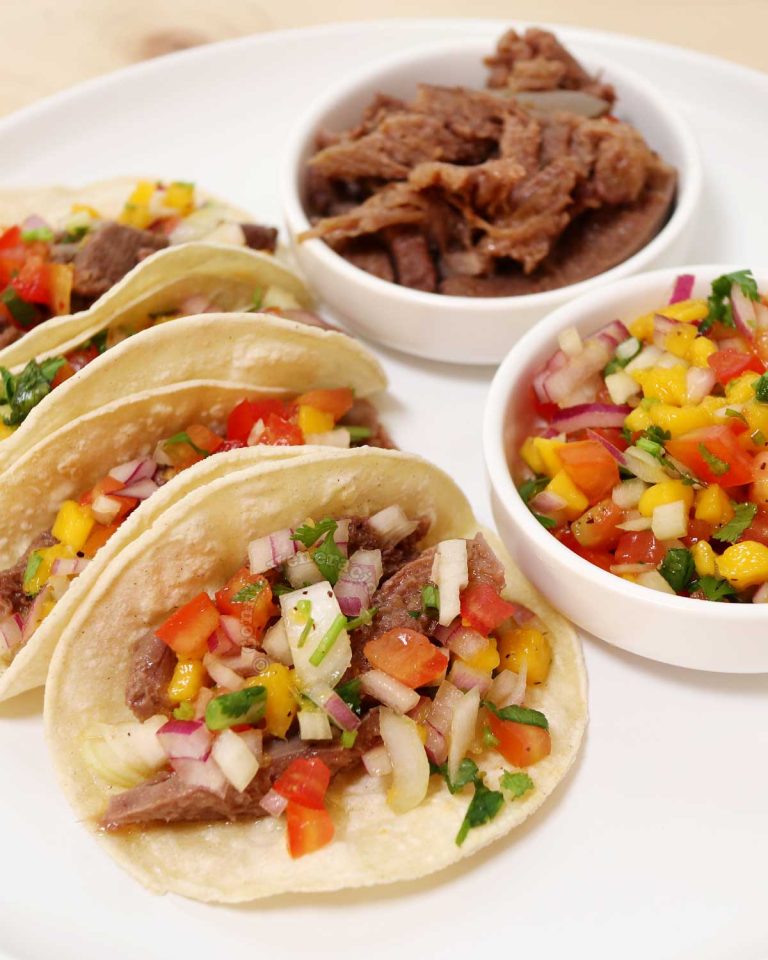 Beef tongue tacos with spicy mango salsa