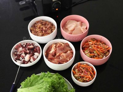 Marinated beef and pork, sliced chicken breast, octopus and vegetables for our Korean grill Christmas day lunch