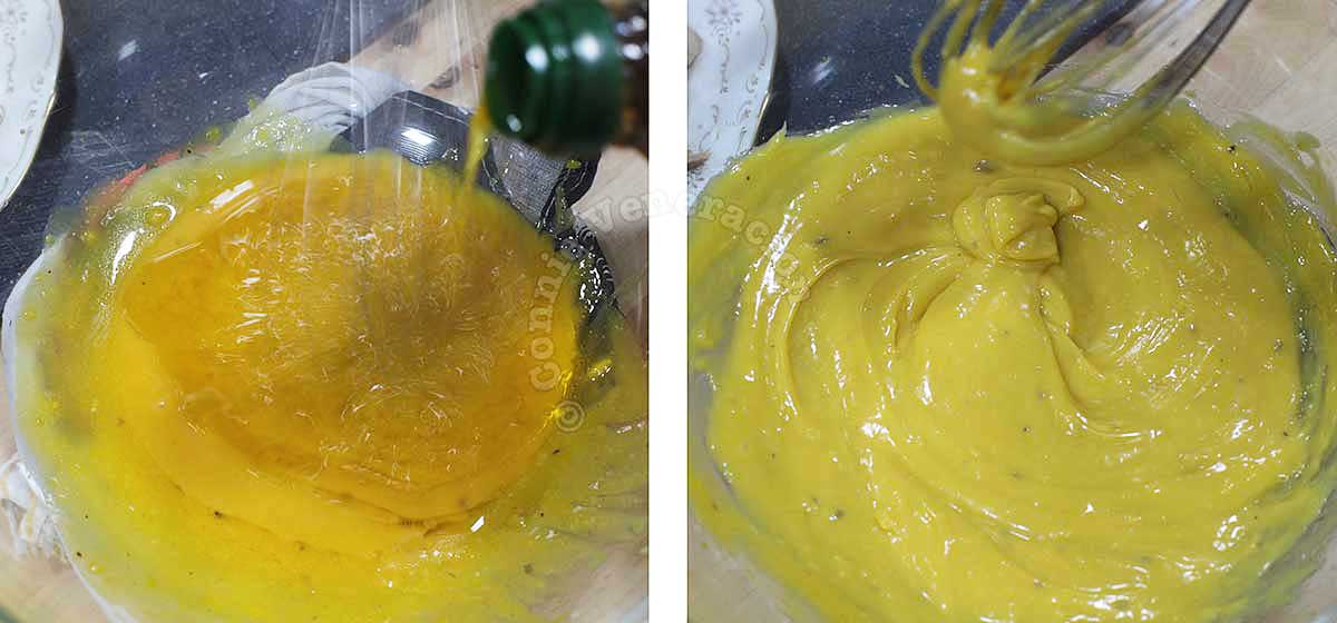 Pouring oil into egg-yolk anchovies mixture to make Caesar salad dressing