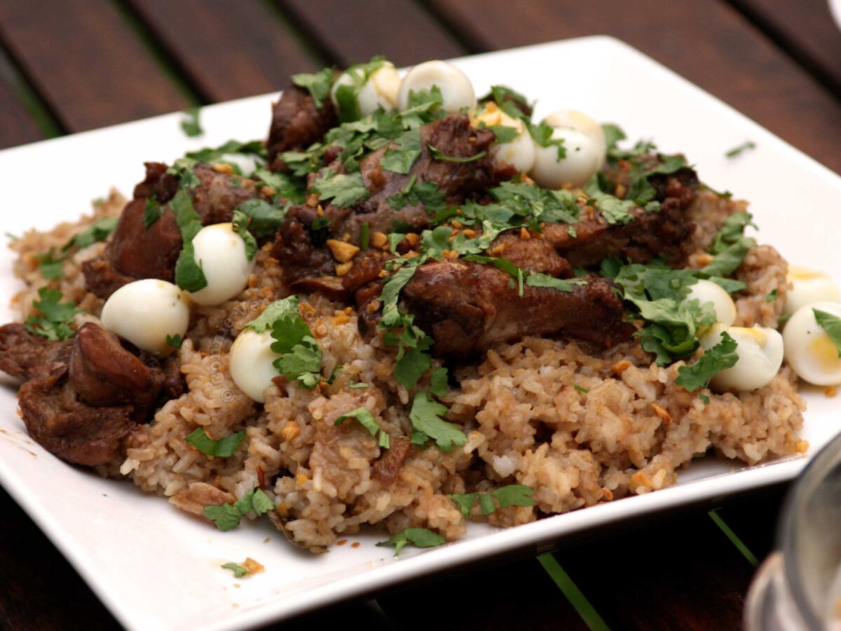 Chicken adobo, quail eggs and rice party plate