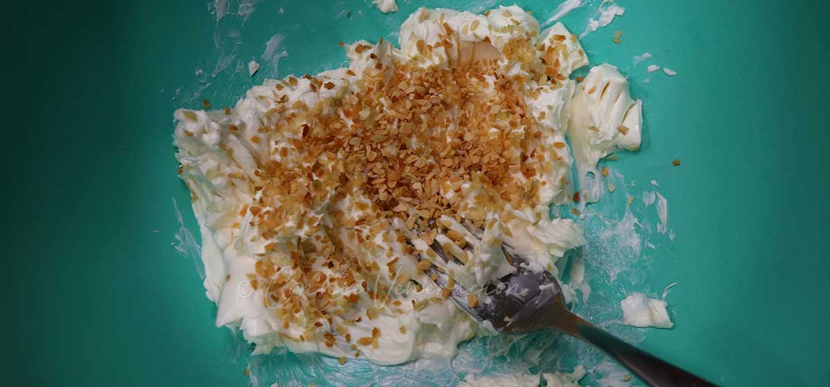 Mixing cream cheese and spices