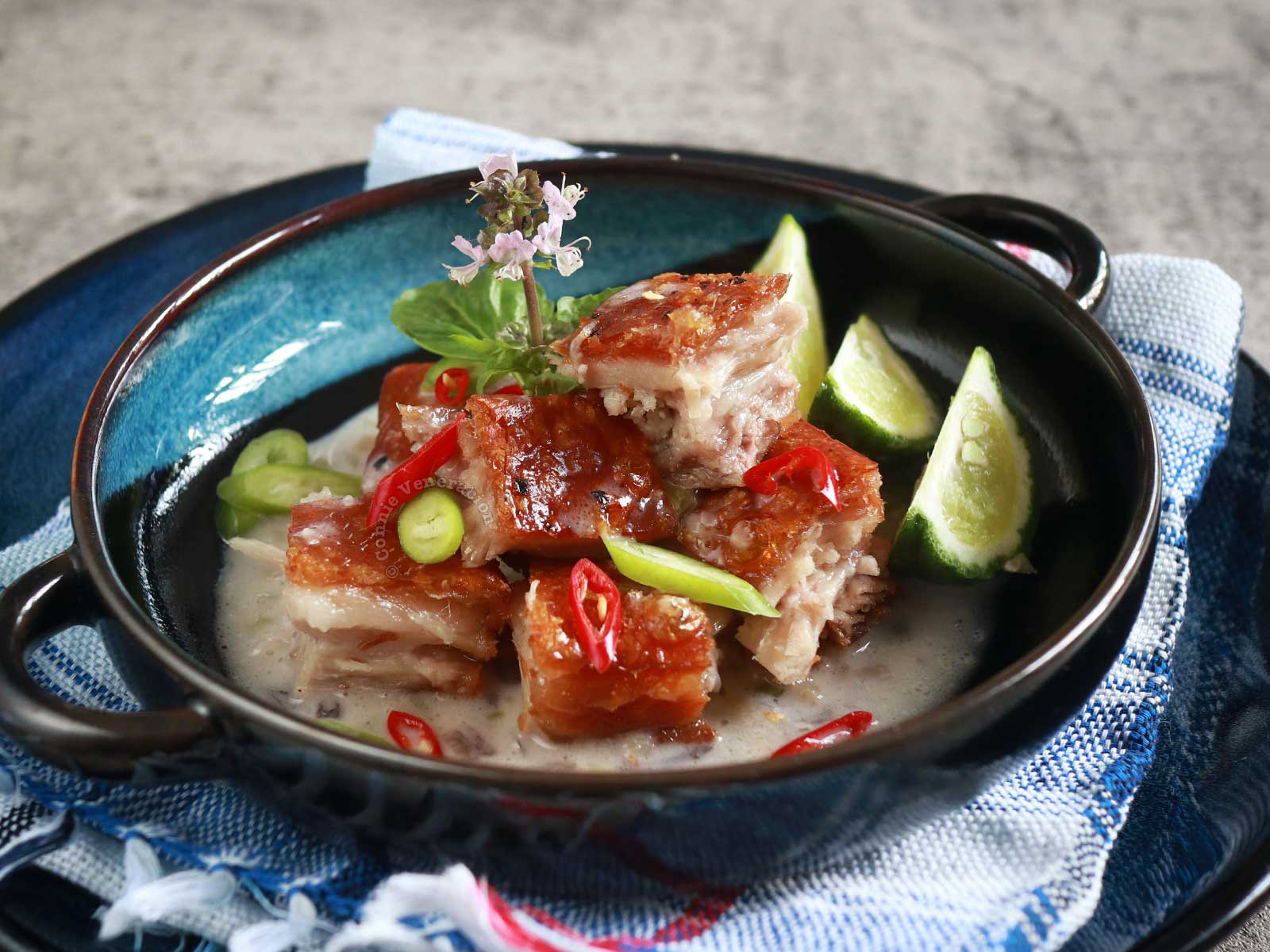 Crispy pork belly in coconut cream sauce