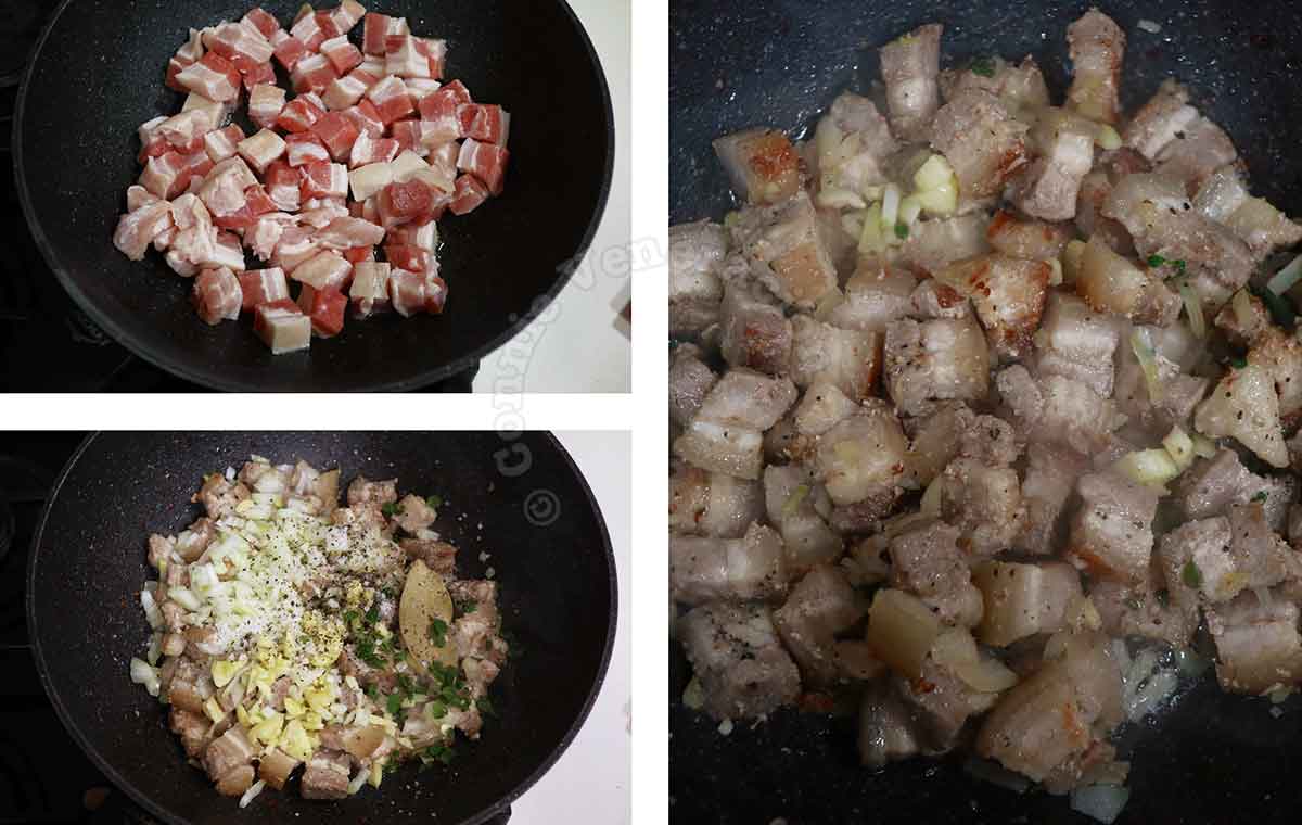 Browning pork belly cubes in pan before sauteeing with garlic, onion, oregano and bay leaf