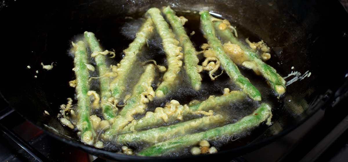Frying battered green beans tempura-style