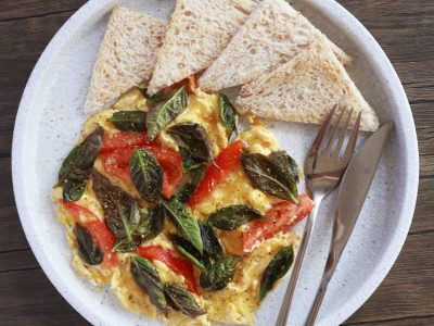scrambled eggs with tomato, basil and cheese inspired by pizza Margherita