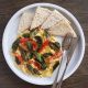 scrambled eggs with tomato, basil and cheese inspired by pizza Margherita