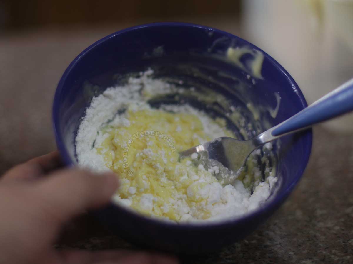 Mixing salted butter with powdered sugar