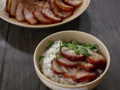 Char siu (Cantonese-style pork BBQ) served over rice