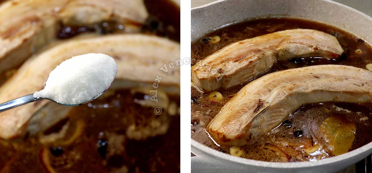 Adding sugar to pork belly and sauce in wok