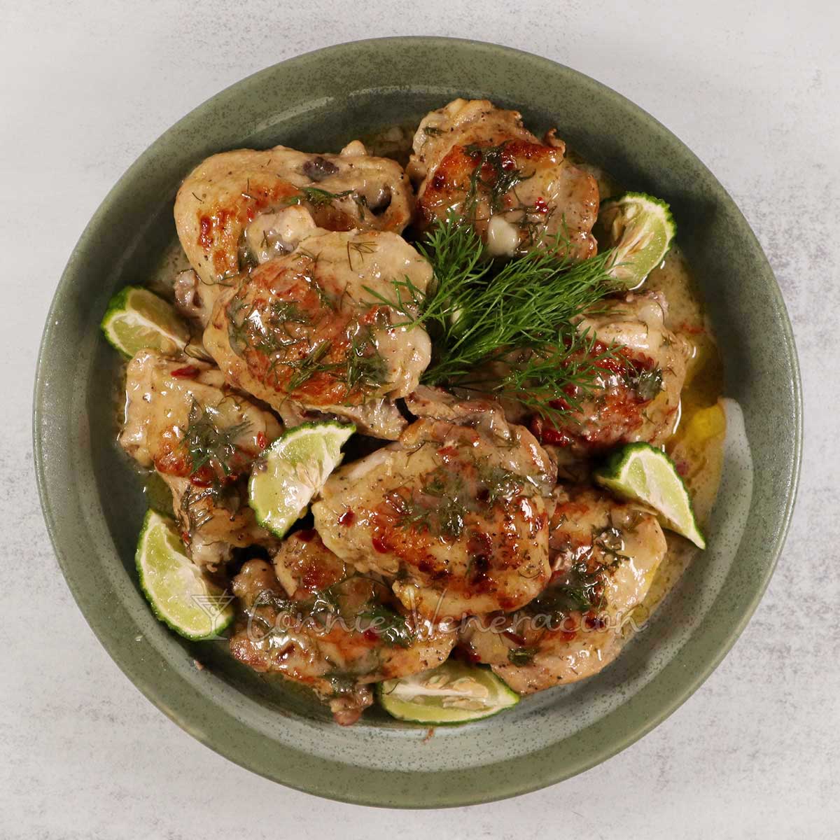 Lime and dill chicken on green stoneware platter