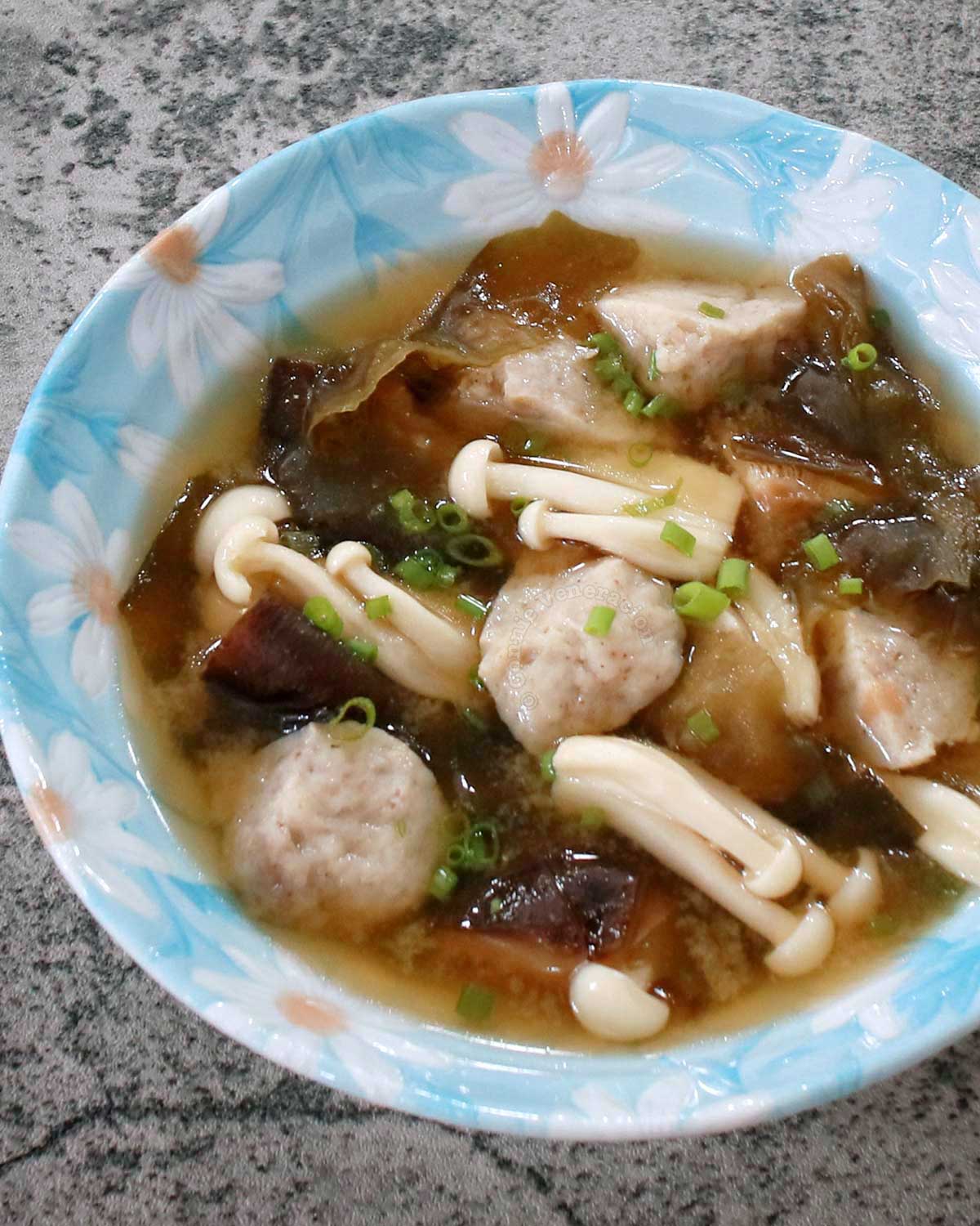 Miso soup with mushroom balls, shiitake and shimeji