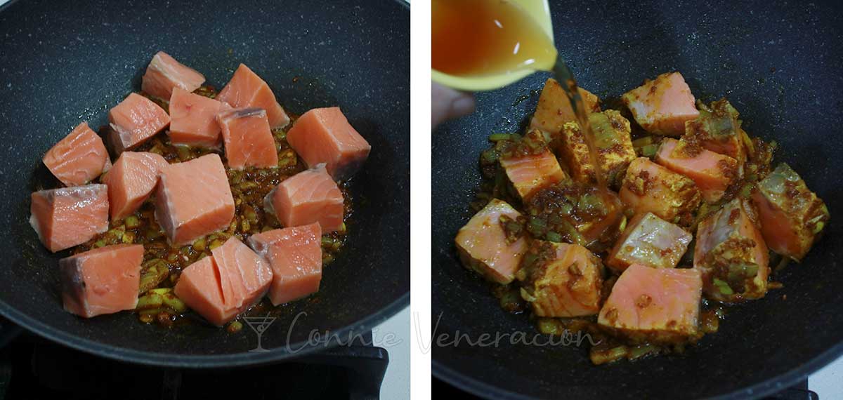 Tossing cubes of salmon fillet to sauteed spices and pouring in fish sauce