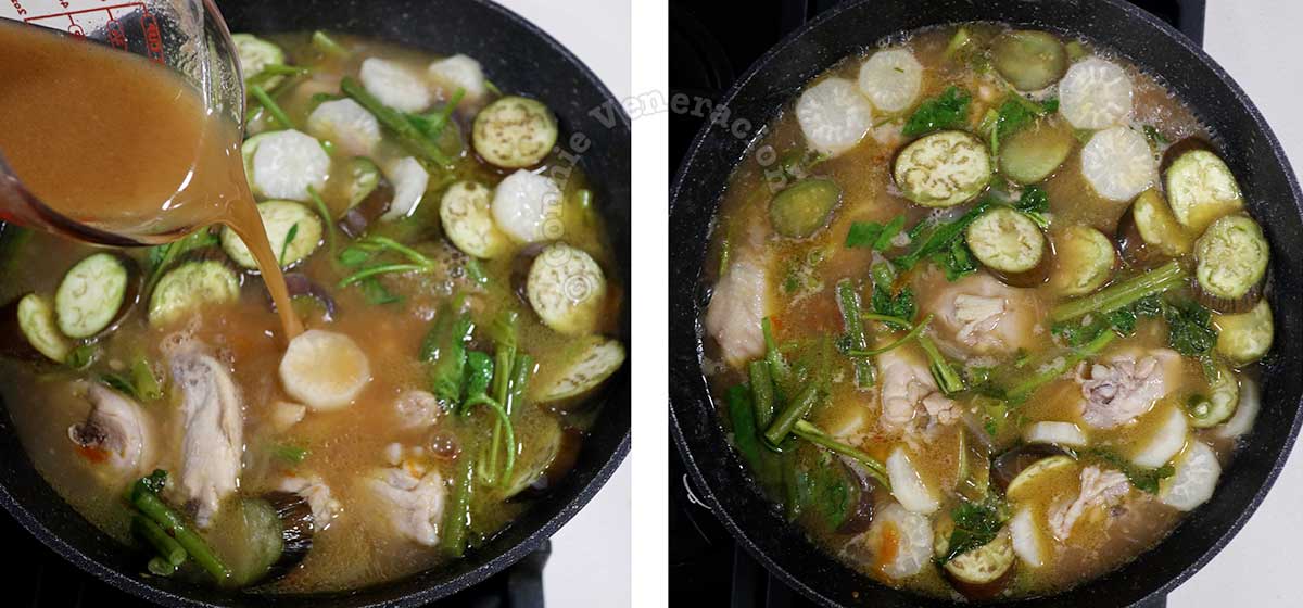 Pouring tamarind extract into pot with chicken and vegetables to make chicken sinigang