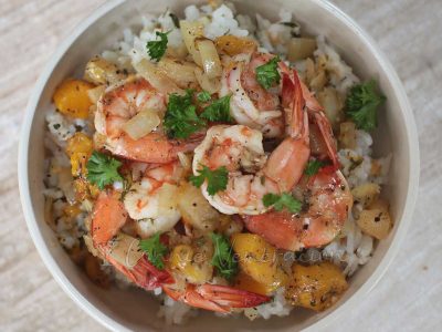 Shrimps with pineapple and mango over rice