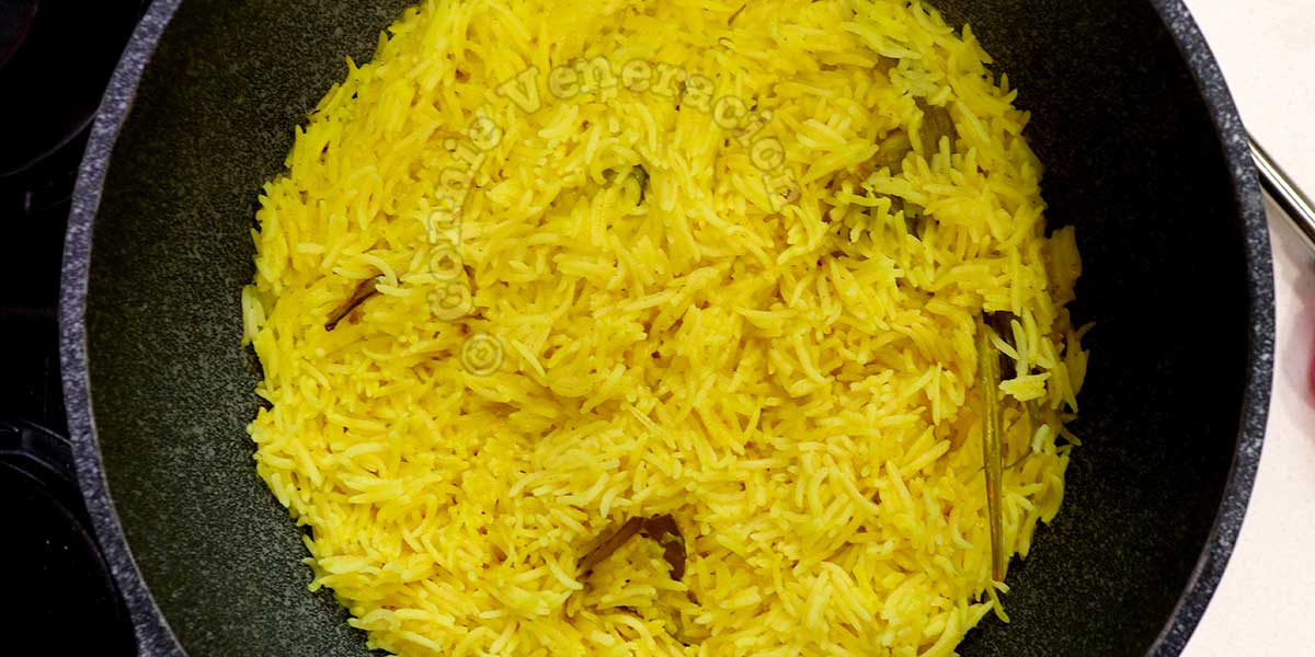 Fully cooked Indonesian yellow rice (nasi kuning) in wok