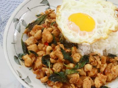 Thai basil chicken (pad krapow gai) served with rice and fried egg