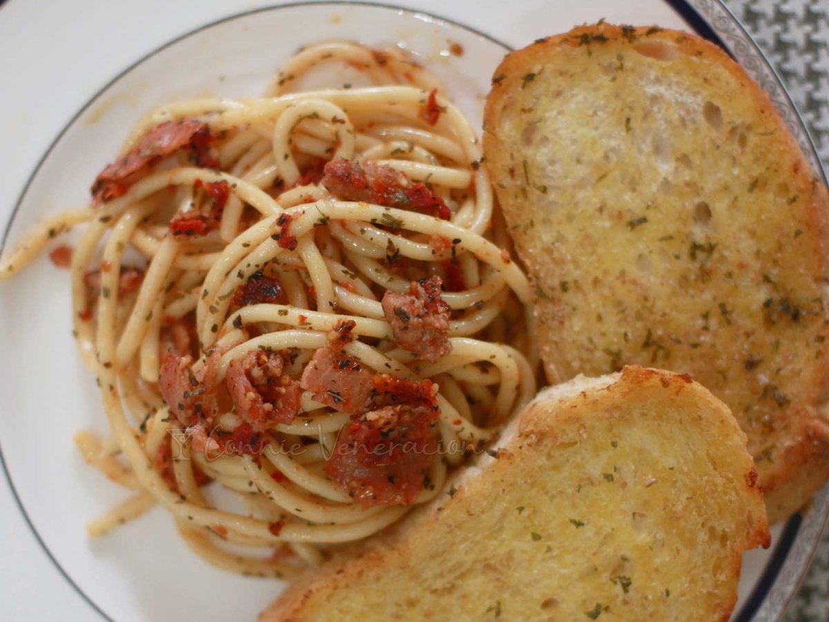 Spaghetti aglio e olio with bacon and Hungarian sausage