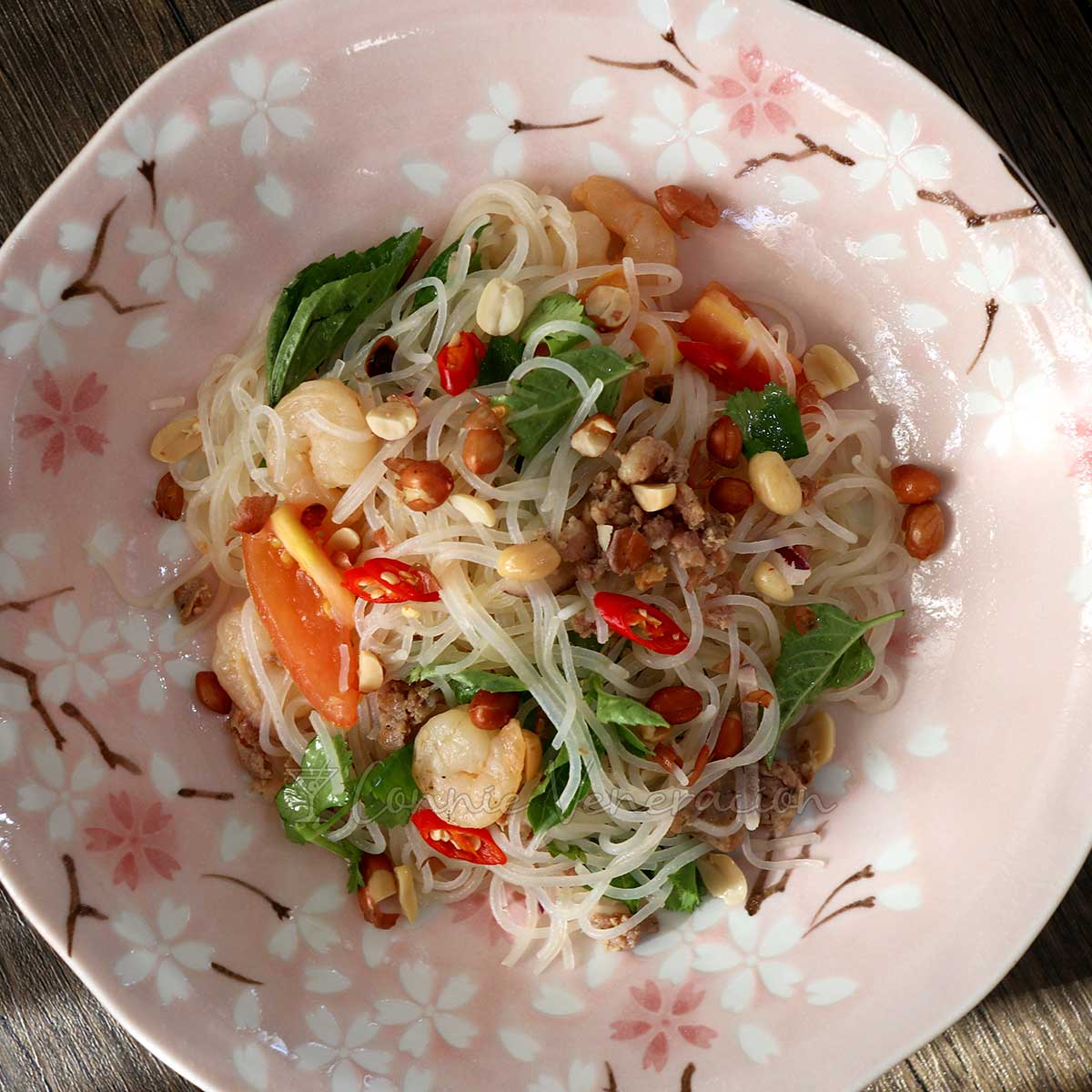 Thai glass noodle salad in pink sakura bowl