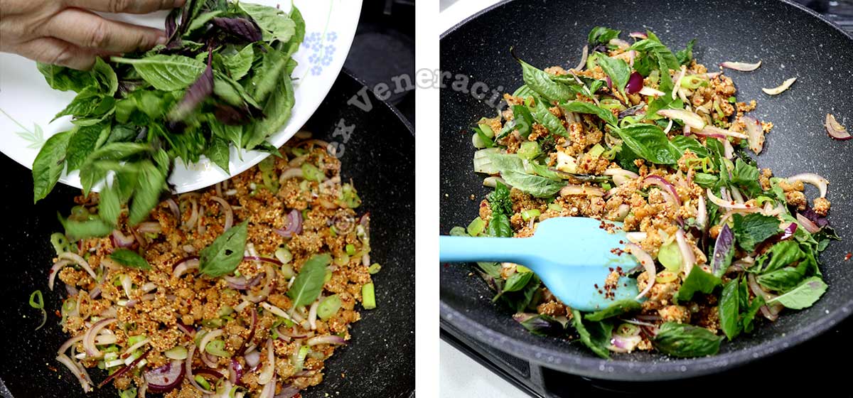 Tossing Thai basil and mint to ground pork to make larb (laab)