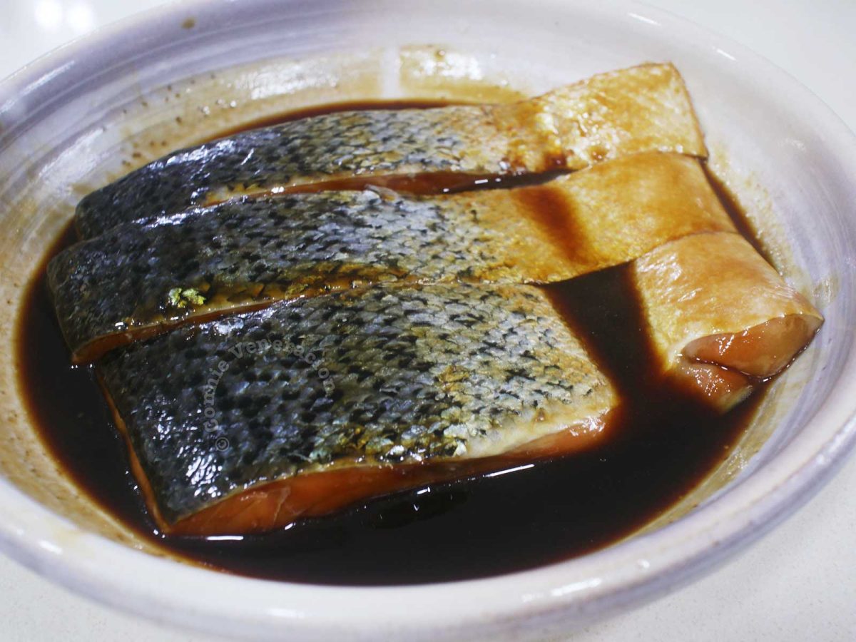 Marinating salmon fillets in reduced teriyaki sauce