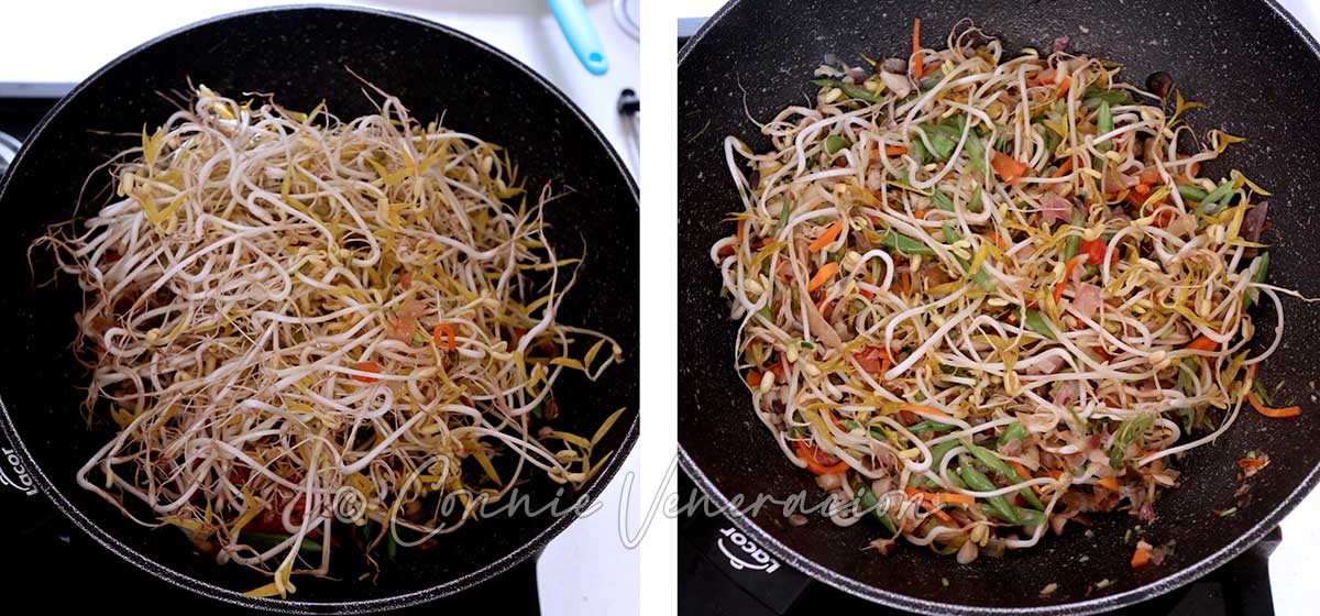 Adding bean sprouts to vegetables in wok