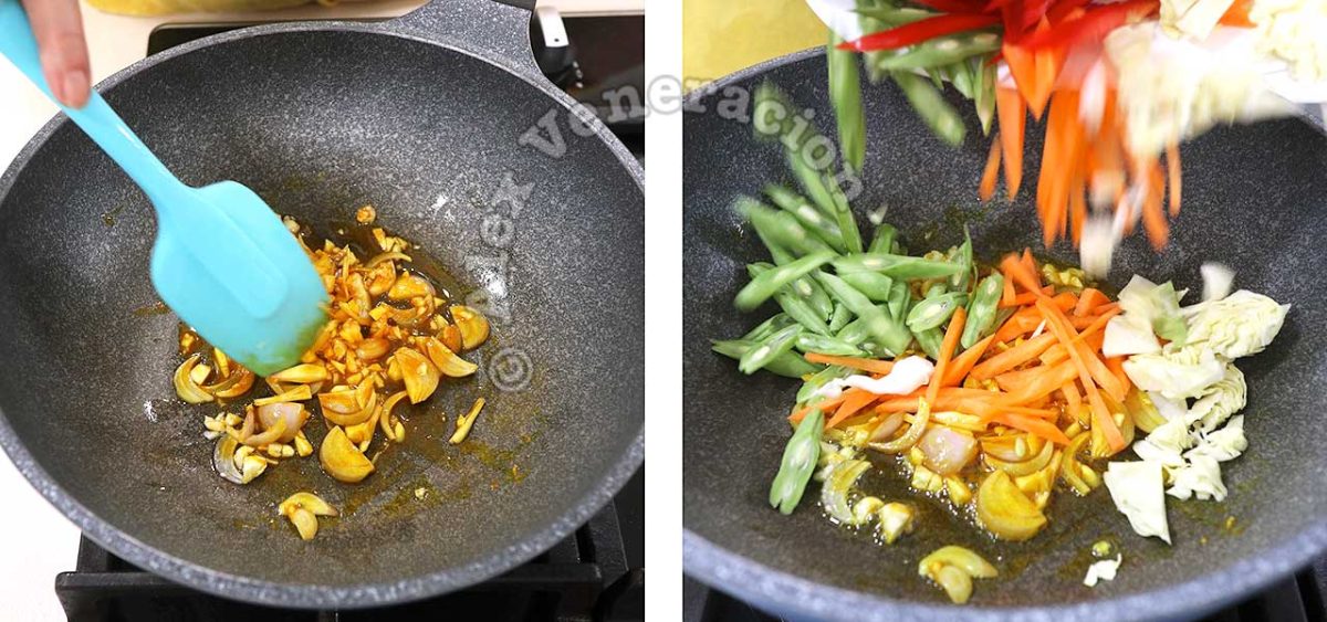 Adding vegetables to sauteed garlic, shallot and curry powder in wok