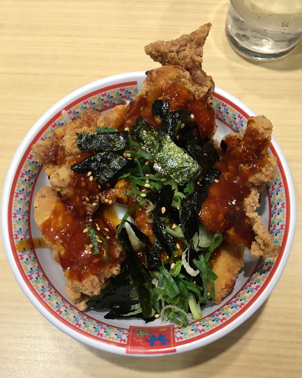 Chicken karaage with sweet spicy sauce and nori in Dotonbori, Osaka