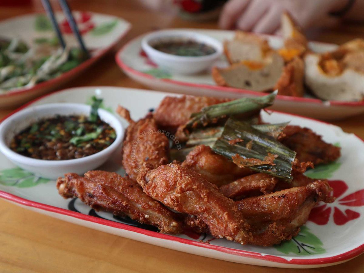 Thai fried chicken wings and dragon eggs in a Chiang Mai restaurant