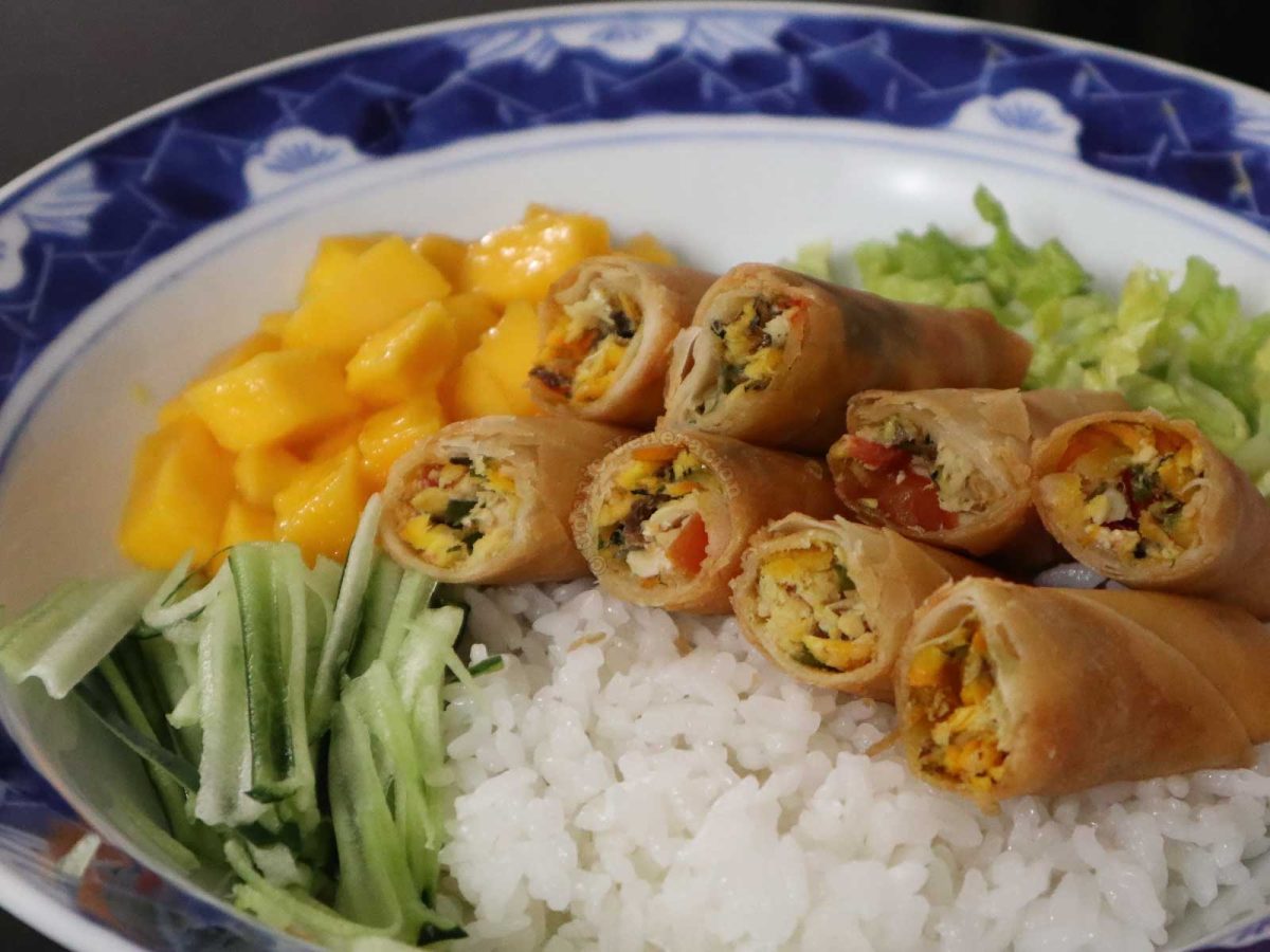 Smoked fish, salted eggs and tomato spring rolls