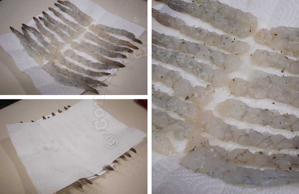 Drying shrimps on paper towels befre seasoning