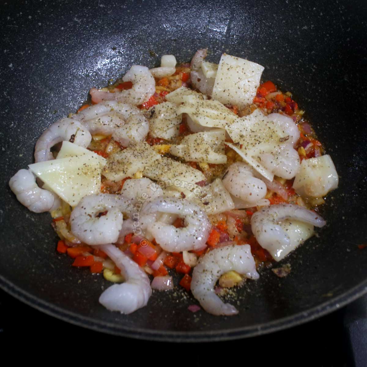 Stir frying shrimps and squid