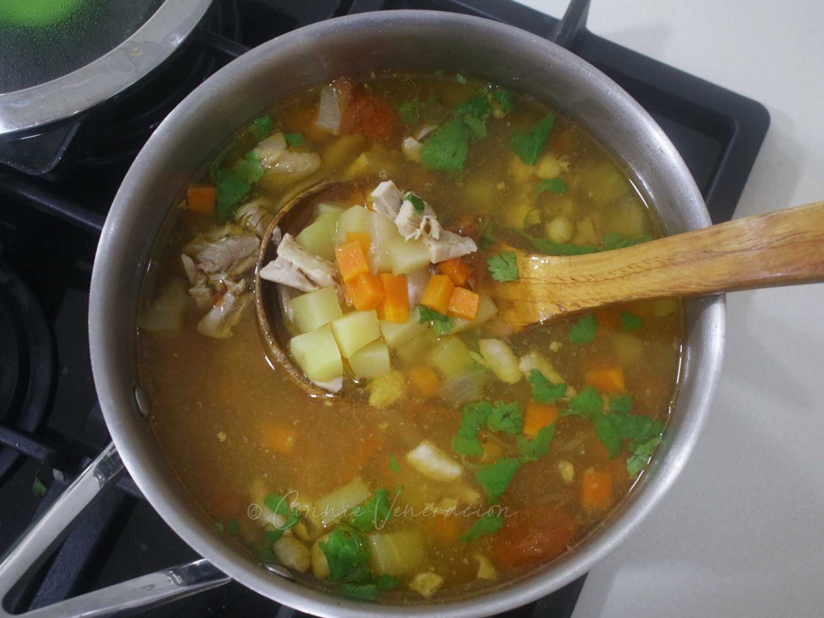 Chicken and vegetable soup in pot