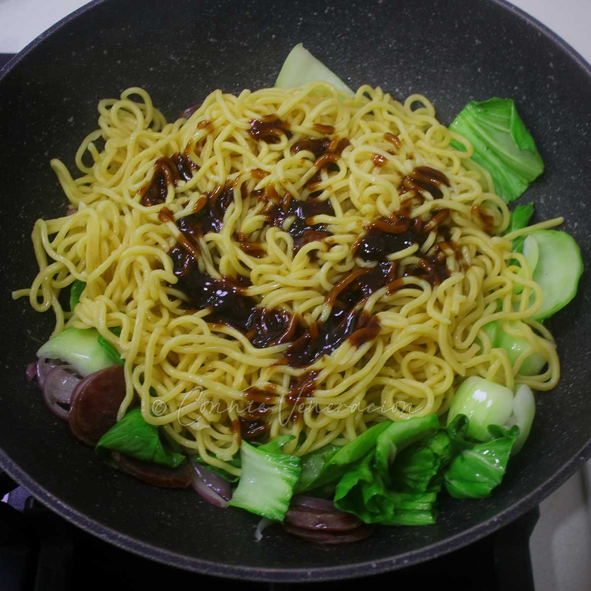 Stir fried noodles, Chinese sausage and bok choy