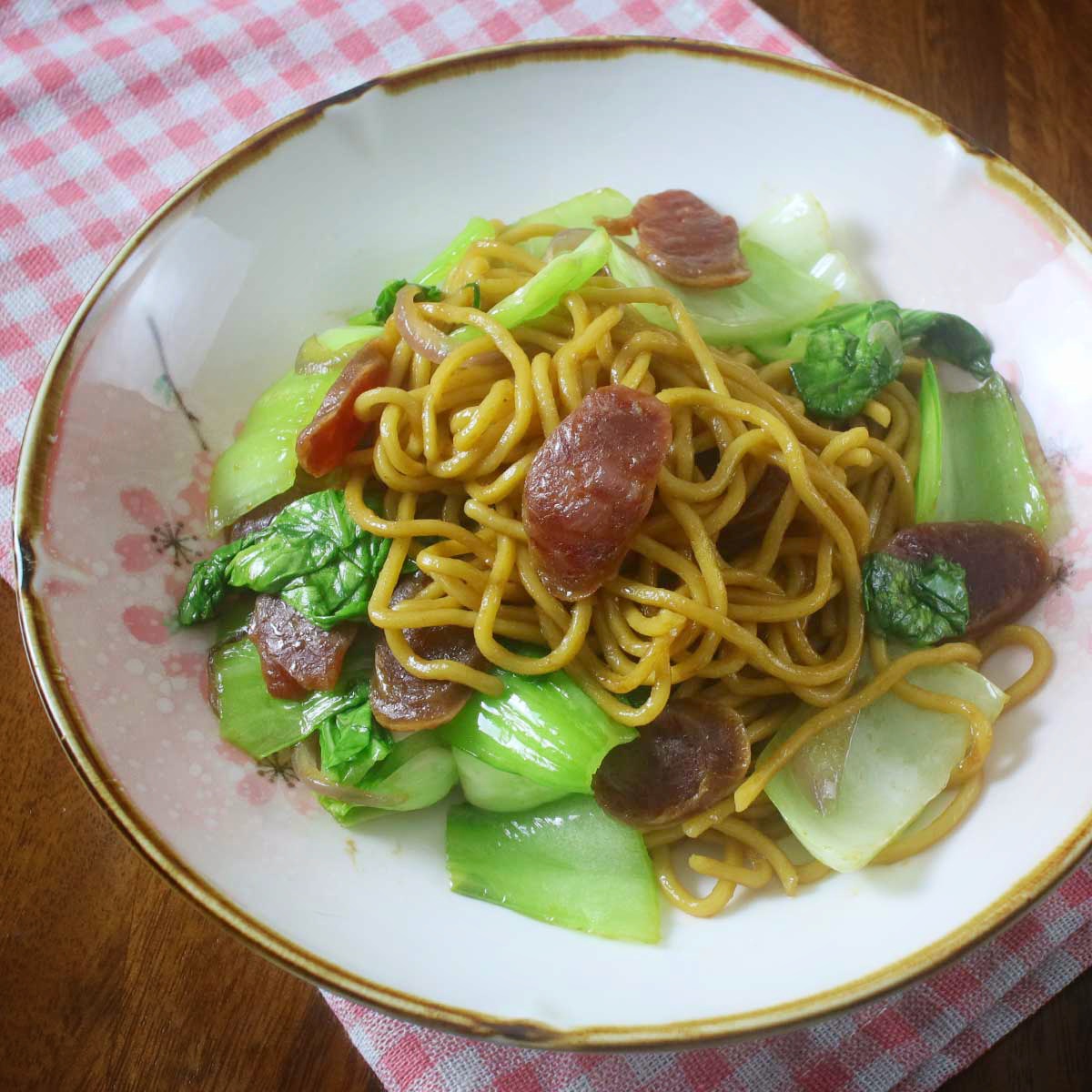 Stir fried noodles, Chinese sausage and bok choy