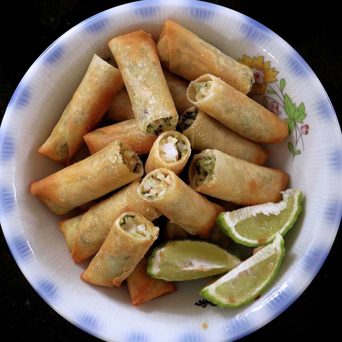Fried spring rolls with shrimp, spinach and cream cheese filling