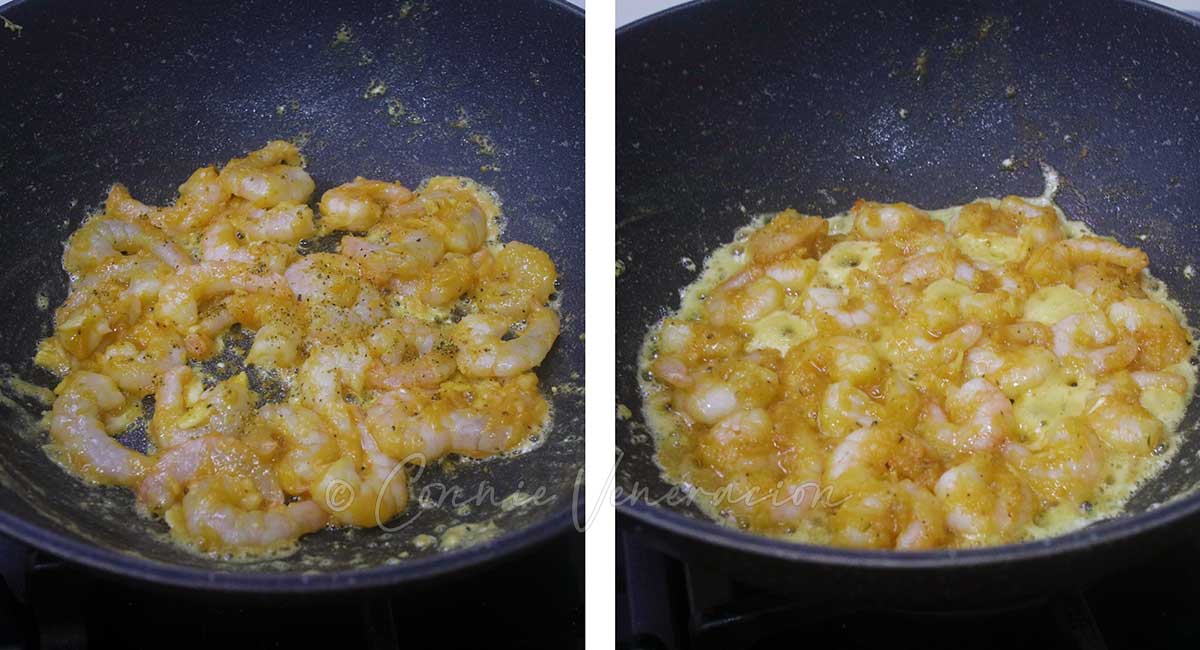 Sprinkling lemon pepper seasoning over shrimps in pan