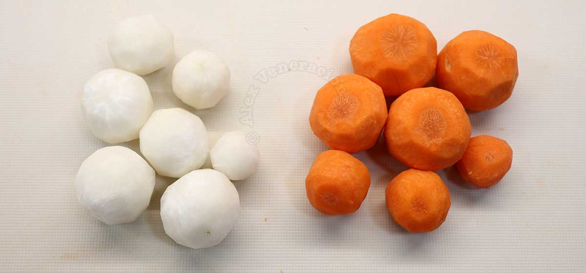 Peeled carrot and radish shaped into balls