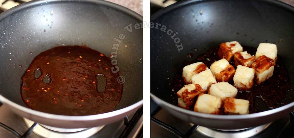 Tossing fried tofu in sauce